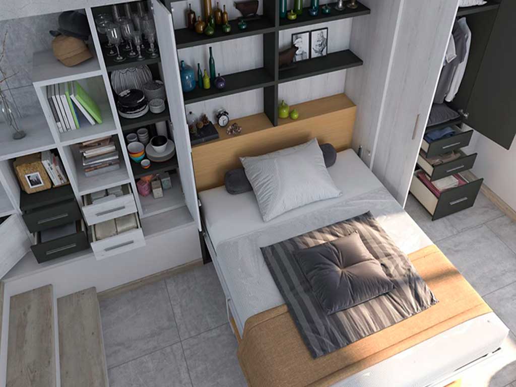 Cama abatible de matrimonio con mesa de salón abatible incoporada.